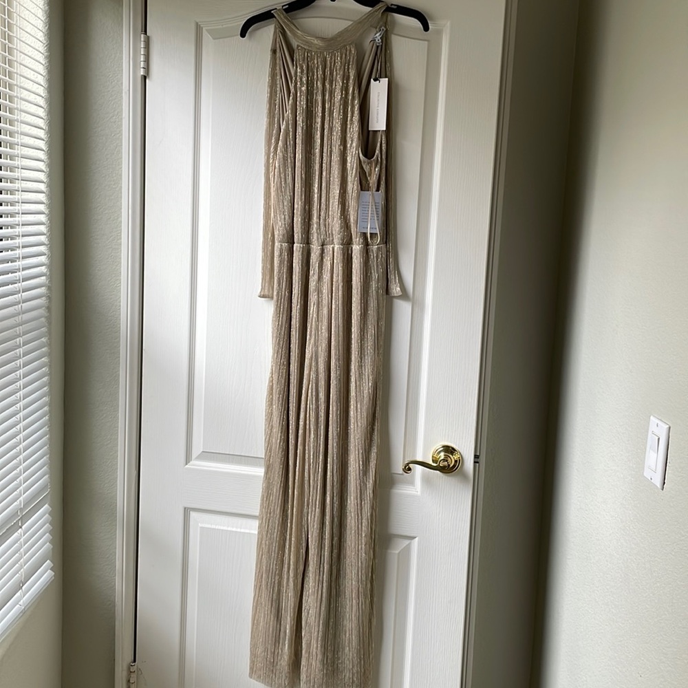 Collective concept Gold Shimmer Halter Jumpsuit Size Medium. With tags on.